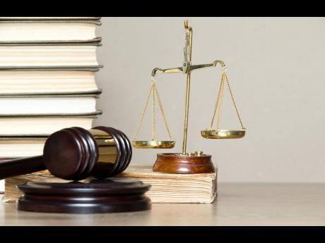 Gavel, scales of justice and law books